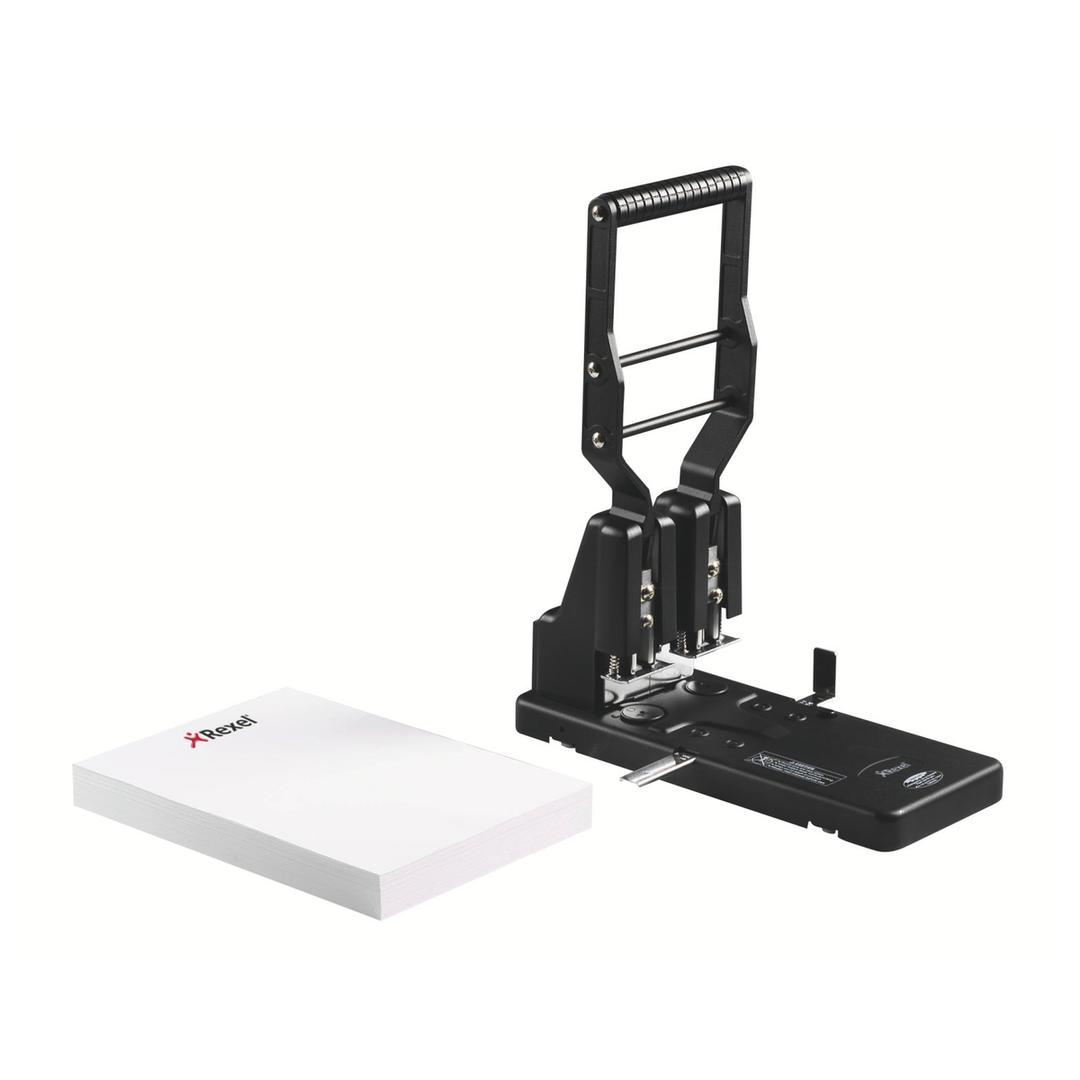 Perforateur 2 trous Rexel HD2300 à côté d'une liasse de feuilles.