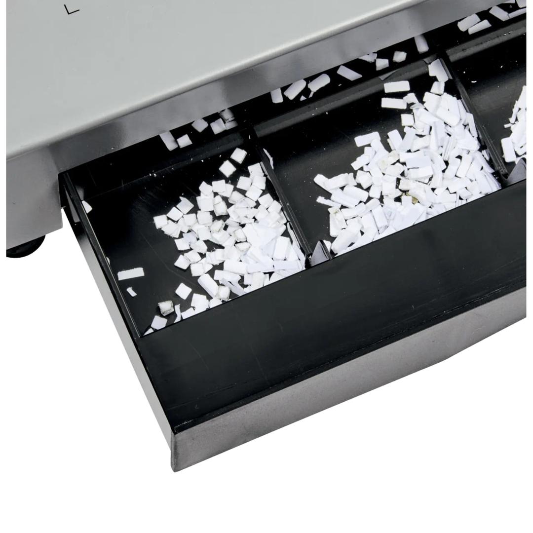 Perforelieuse électrique à pédale, peignes plastiques CB25E Pro GBC - Et son bac à confettis après perforation des feuilles