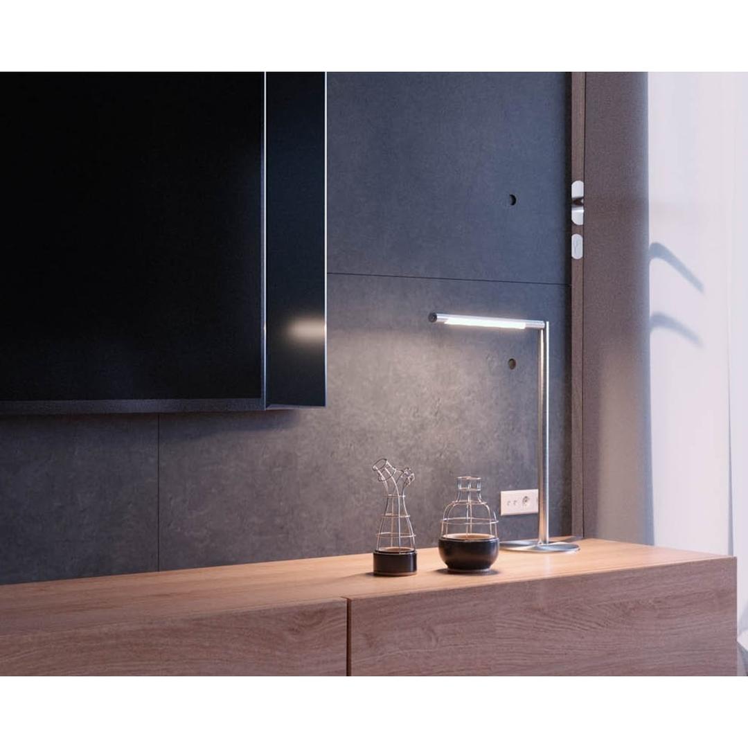 Lampe de bureau LED, IRC supérieur à 90 Aura argent HANSA - Lampe de bureau Hansa Aura argent, sur un meuble, le soir