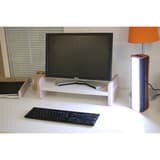 Lampe de luminothérapie LED, debout ou couchée Dayvia MOBILLY UNILUX - Lampe de luminothérapie LED UNILUX Dayvia MOBILLY noir et bambou à côté d'un écran de bureau