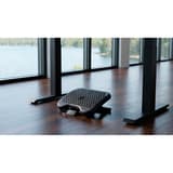 Repose-pieds réglable, 3 hauteurs et picots Footness Comfort HANSA - Repose-pieds Hansa Footness Comfort, pieds posés dessus sous un bureau