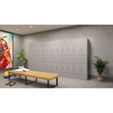 Vestiaire 2 portes en acier, 2 x 121 litres PL1230, serrure à clé PHOENIX - Vestiaire Phoenix PL1230 serrure à clé gris clair, en situation dans un vestiaire