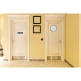 Plaque Toilettes handicapés EXACOMPTA collée sur une porte