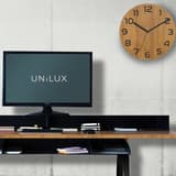 Horloge murale en bambou, Ø 30 cm PALMA Bamboo UNILUX - Horloge murale en bambou UNILUX PALMA Bamboo, en situation dans un bureau