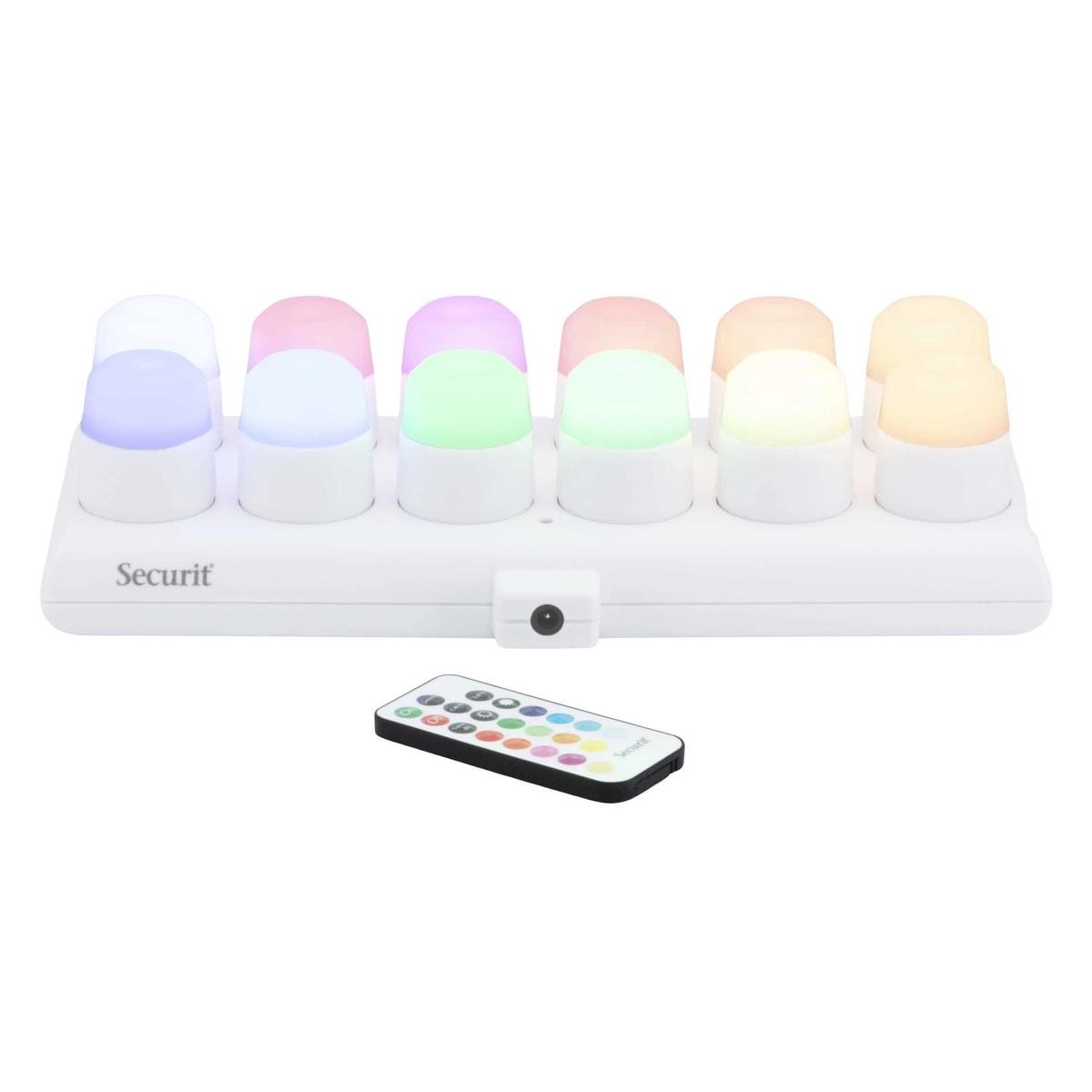 Bougies LED rechargeables Securit AMSTERDAM RVB sur leur station, avec la télécommande