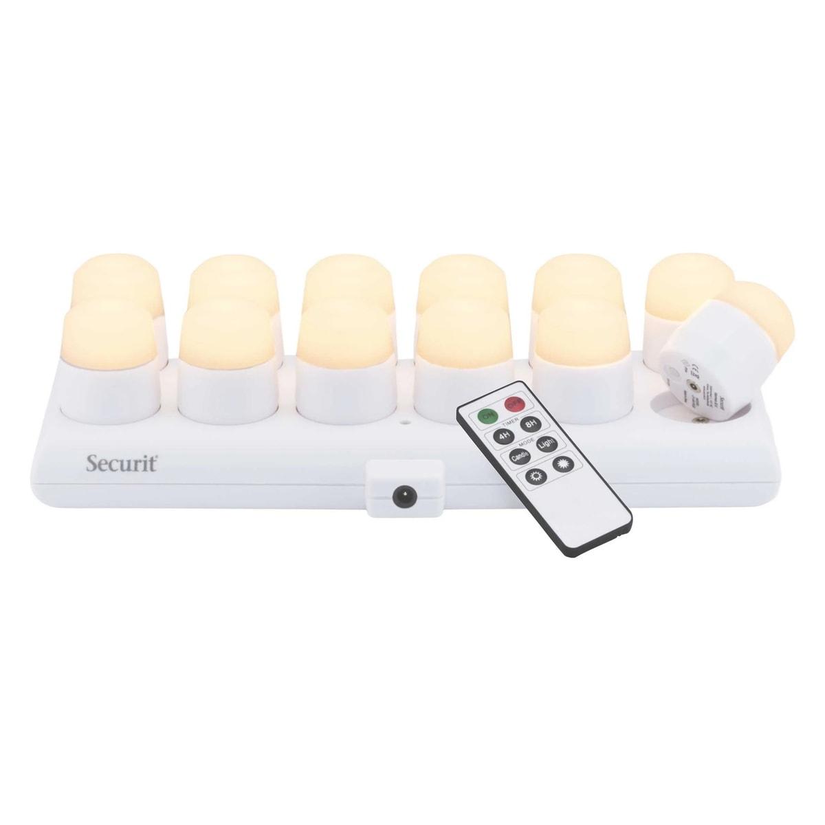Bougies LED rechargeables Securit AMSTERDAM blanc chaud sur leur station, avec la télécommande