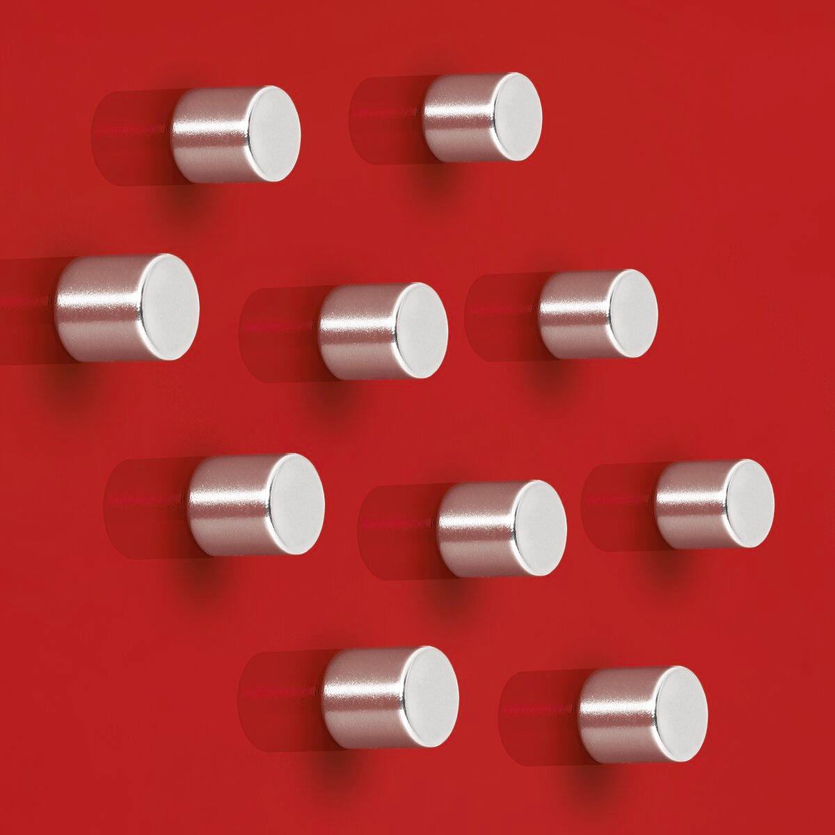 Dix aimants néodyme cylindriques SuperDym sigel sur un tableau en verre rouge